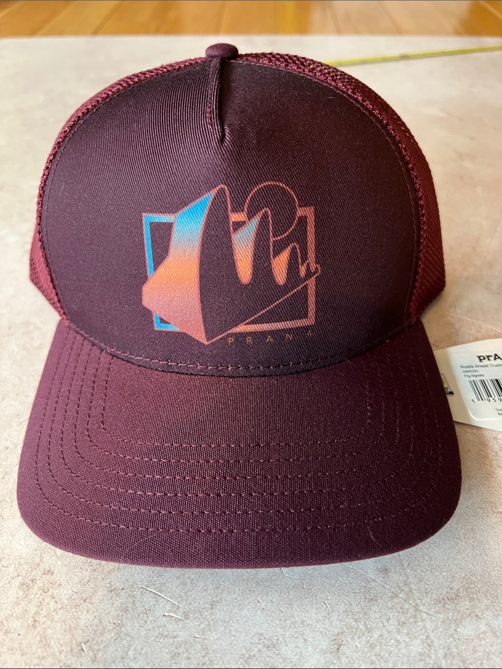 Prana Unisex Roads Ahead Trucker Hat in Maroon and Fig. OS